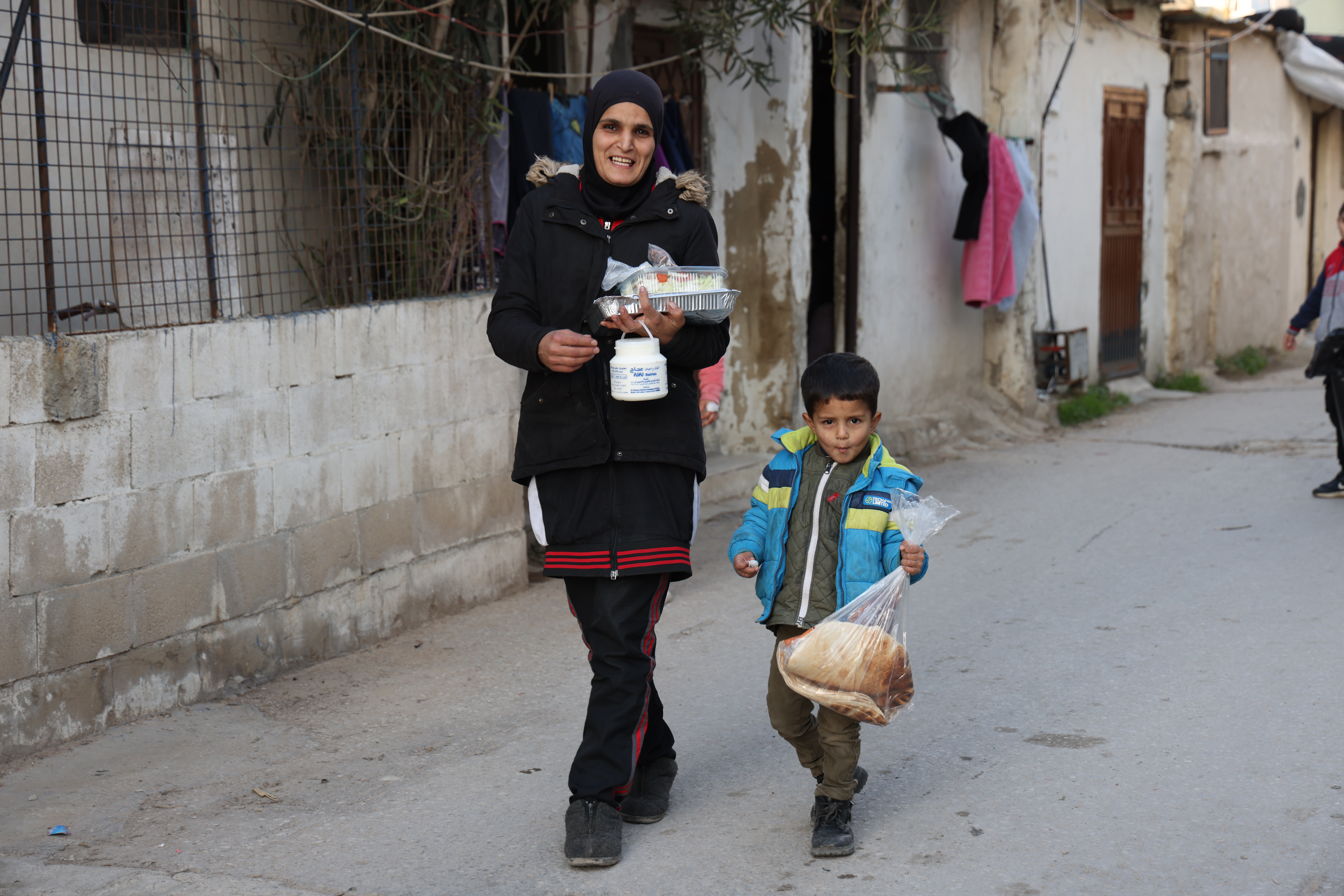 Elderly woman receiving food assistance